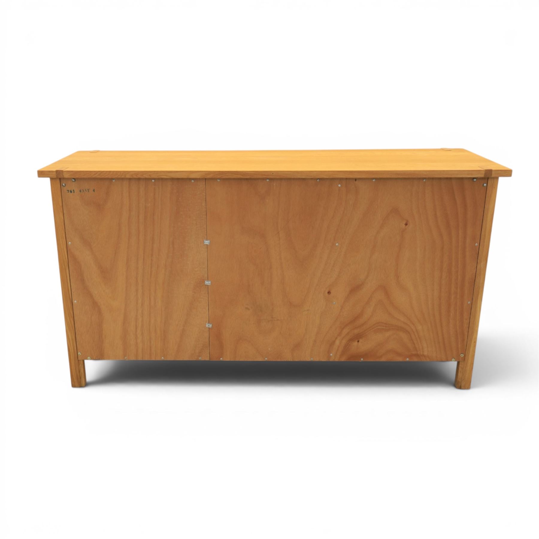 Contemporary Oak sideboard, rectangular top with tenon detailing, three drawers over three cupboard doors, blackened metal handles, raised on square supports