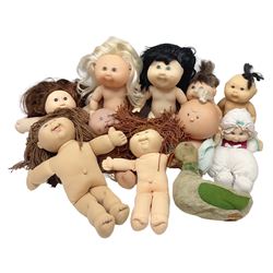 Plush covered soft toy of a swimming duck with squeeze type musical action L17cm; and collection of ten Cabbage Patch type dolls by various makers including Mattel, Hasbro, Appalachian Artworks, Migliorati etc