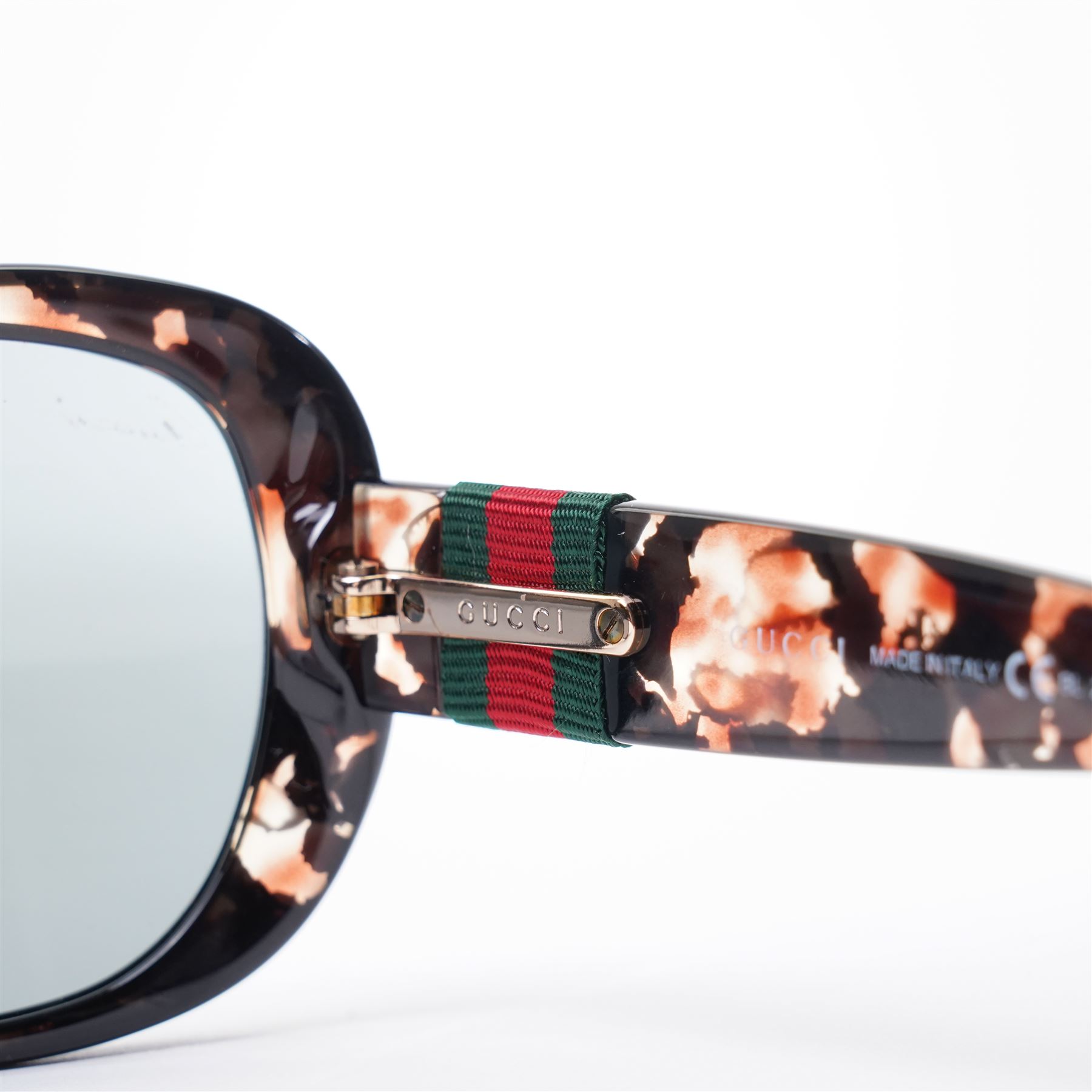 Gucci - pair of oversized sunglasses, with graduated mirrored lenses in tortoiseshell-effect frame, the arms with signature web stripe and interlocking gold-tone GG logo, unused with original monogram leather case 