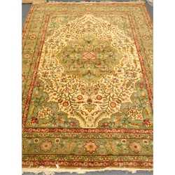  20th century Turkish carpet, green ground with geometric pattern, 370cm x 278cm  