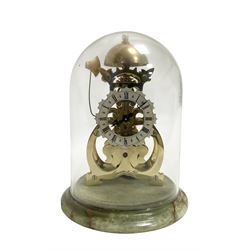 Thwaites & Reed - Small 20th century skeleton clock with a glass dome and stepped onyx base,  pierced movement frames with a silver chapter ring, Roman numerals, minute markers, and steel hands, domed brass bell with passing strike on the hour, with a lever platform escapement, wound and set from the rear. With key.