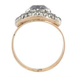 George III gold and silver old cut diamond cluster ring, the principal diamond of approx 0.75 carat, with pave set old cut diamond surround
