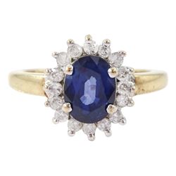 9ct gold oval cut sapphire and round brilliant cut diamond cluster ring, hallmarked