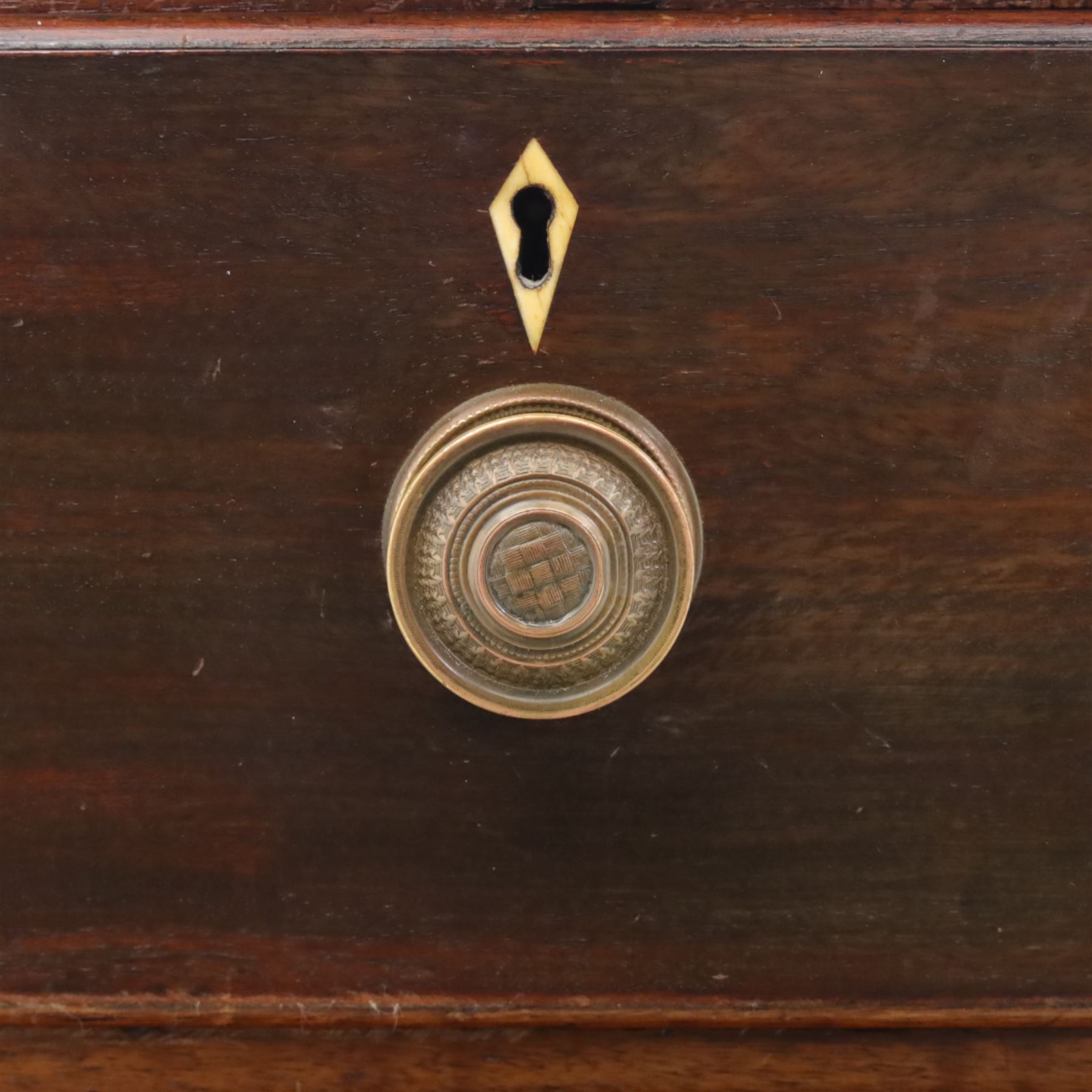 19th century mahogany chest, with a rectangular top over two short and three long graduated drawers fitted with turned knobs and bone escutcheons, raised on shaped bracket feet