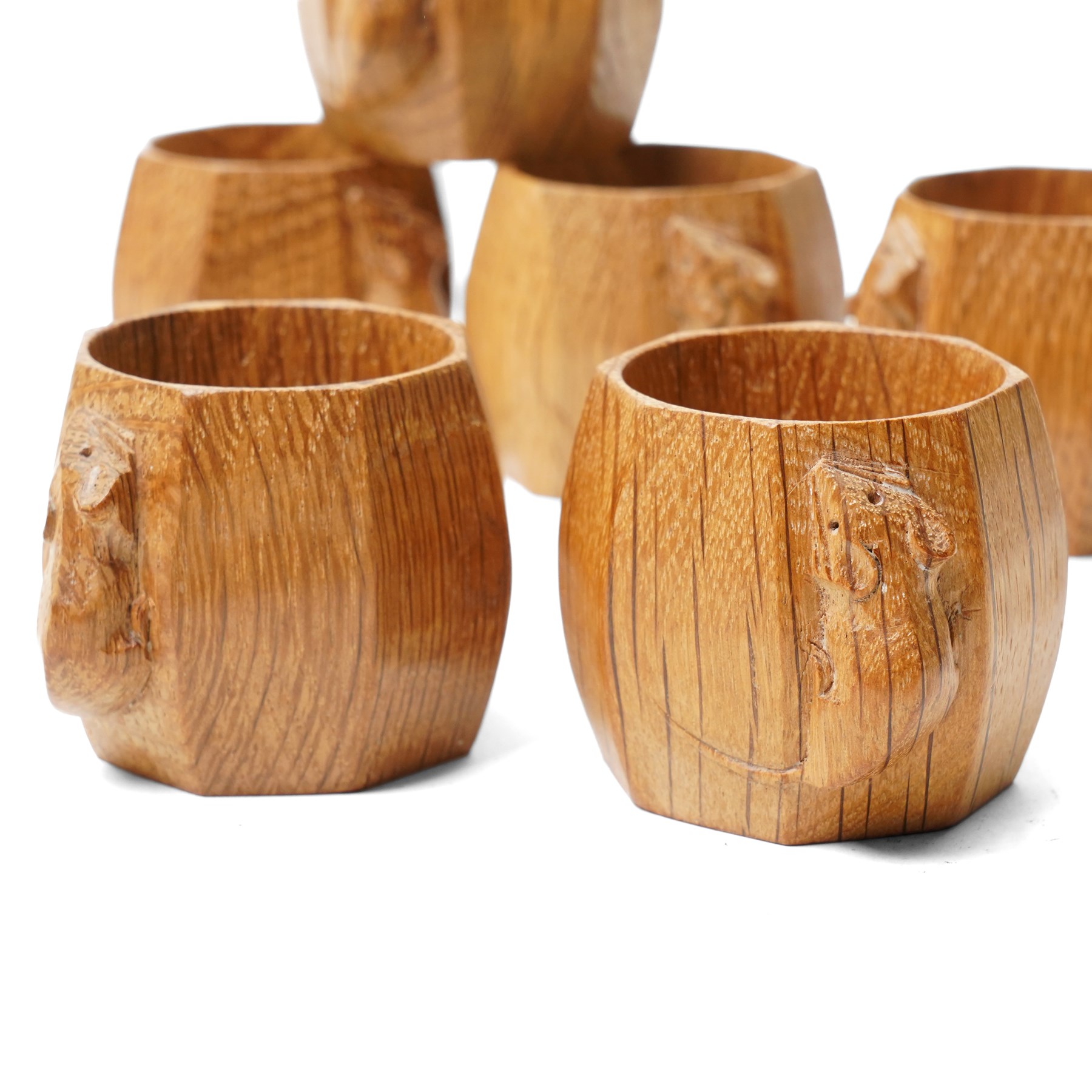 Mouseman - set of six oak napkin rings, with carved mouse signature, by the workshop of Robert Thompson of Kilburn