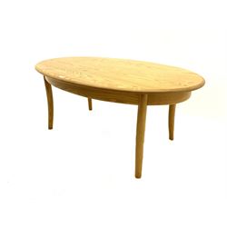 Ercol light elm oval coffee table