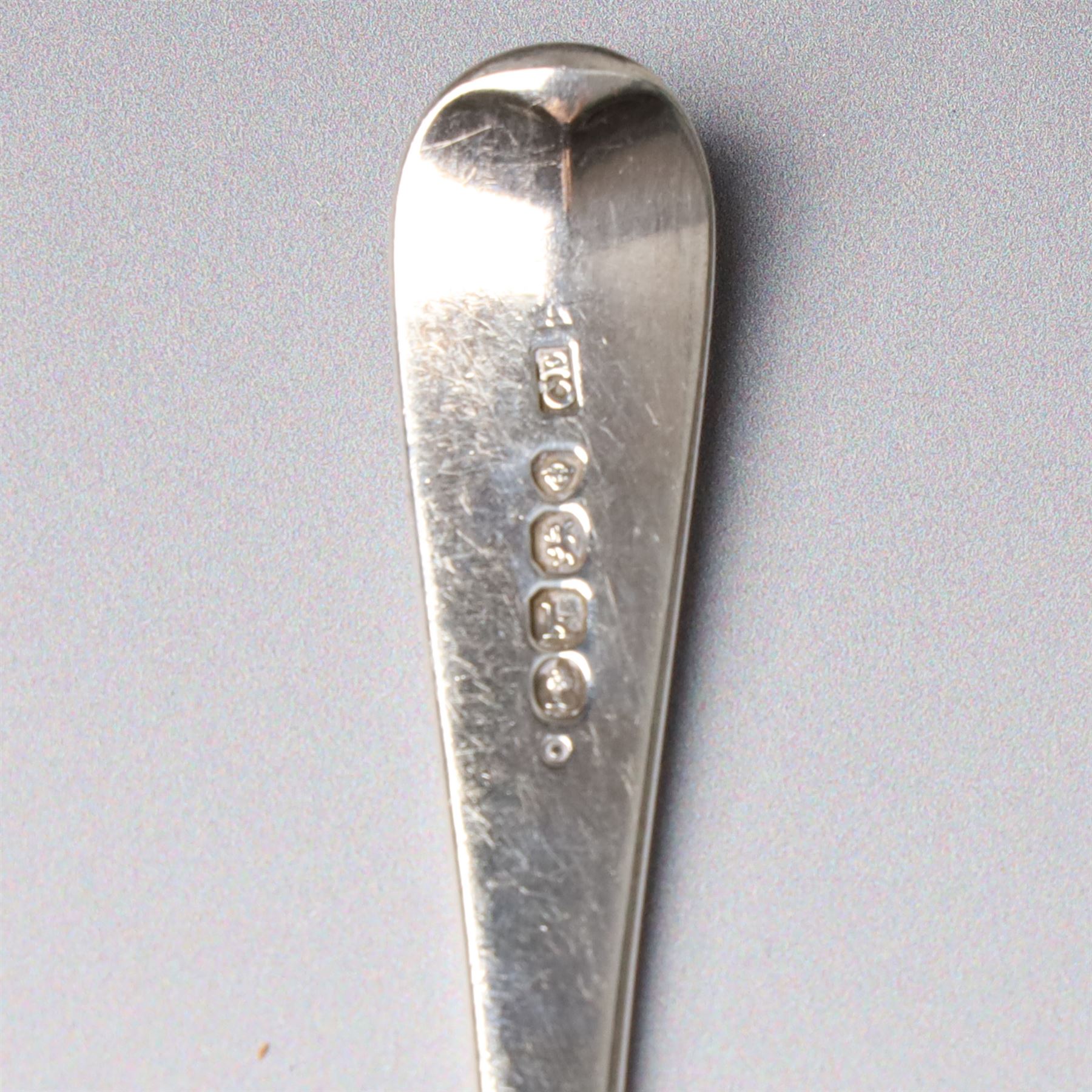 19th century Scottish silver fiddle pattern toddy ladle, Edinburgh 1837 Maker Millidge & Son, another Edinburgh 1835 Maker James McKay, George IV silver sauce ladle with fluted bowl London 1825 Maker Charles Eley and an Edwardian sauce ladle (4)