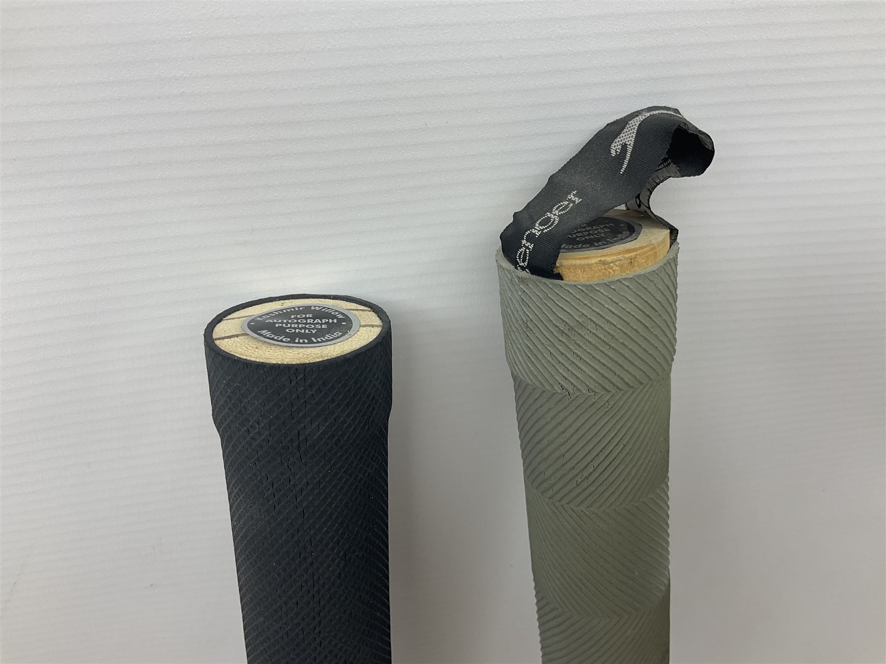 Two signed Yorkshire County cricket bats, from 2007 and 2008 seasons, bearing signatures including Darren Gough, Jason Gillespie, Younus Khan, Michael Vaughn and Tim Bresnan, etc