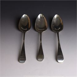 Three George III silver Old English pattern table spoons, one with engraved monogram to terminal, hallmarked Solomon Hougham, London 1802, a further example hallmarked London 1805, makers mark indistinct and one other hallmarked George Wintle, London 1807