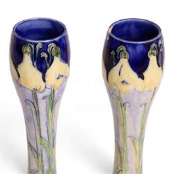 William Moorcroft for James MacIntyre, Pair of Florian Ware Snowdrop vase, circa 1902, waisted elongated gourd form, printed mark and green signature