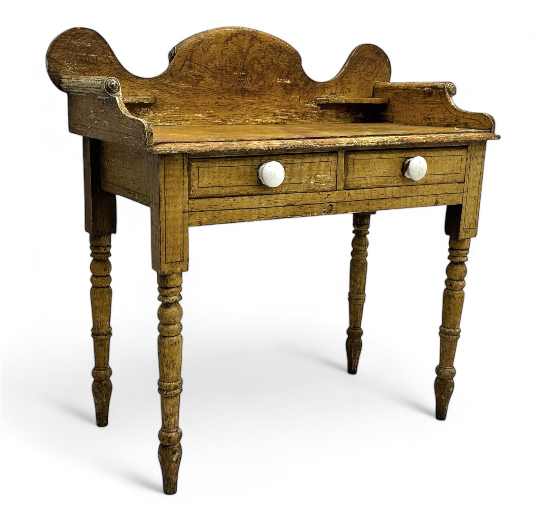 Victorian scumbled pine dressing table, rectangular top with shaped and scrolled gallery back, fitted with two drawers with ceramic knobs, on turned supports