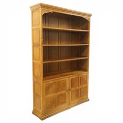 Beaverman - Yorkshire oak open bookcase, with adjustable shelves, panelled sides and lower cupboard doors, with carved beaver signature, by Colin Almack of Sutton near Thirsk
