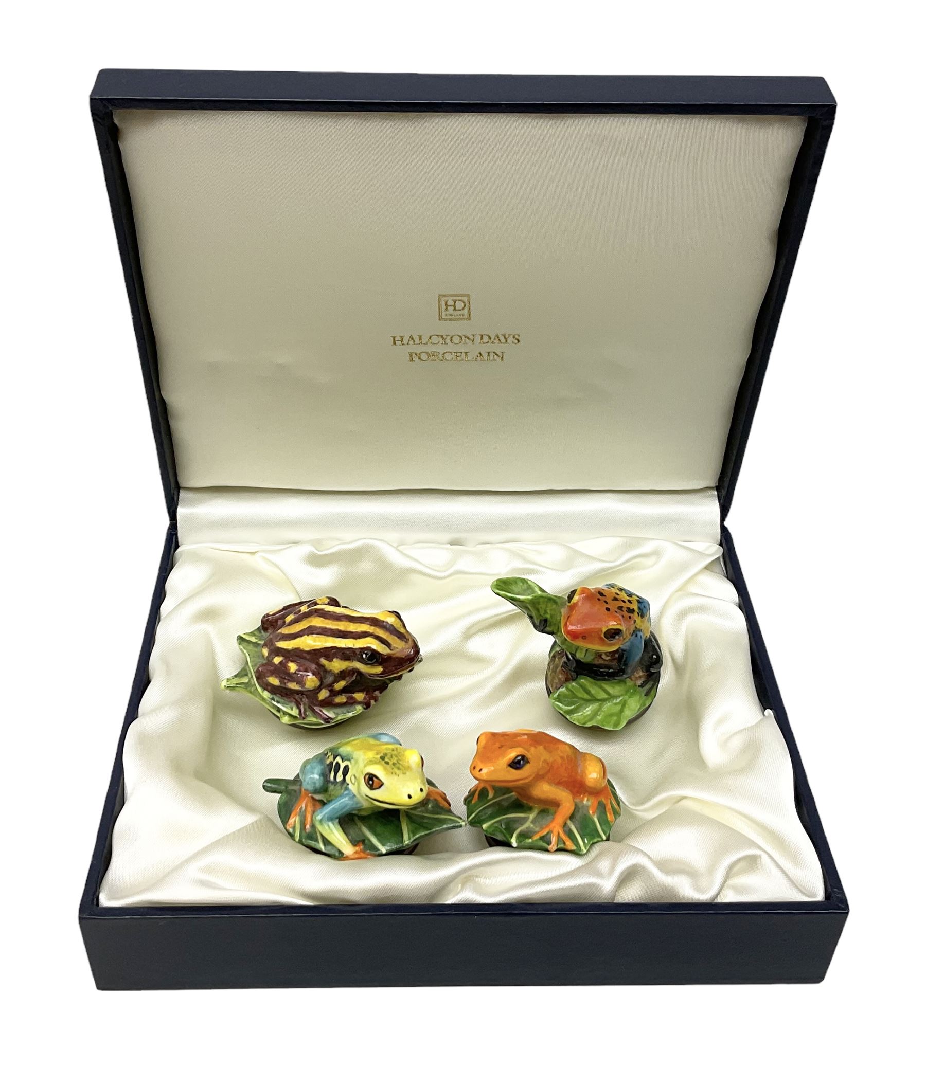 Four Halcyon Days bonbonnieres modelled as frogs, Golden Toad, Red-eyed frog, Dart-poison frog, and Poison Dart frog, in single box 