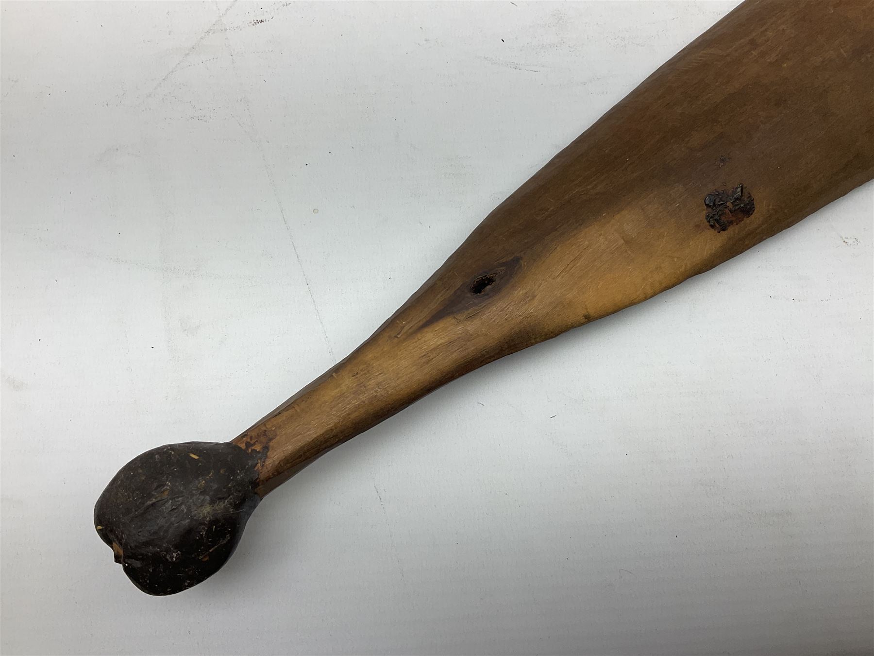 Australian Aboriginal shield, carved with Kangaroo and Emu, 74.5cm; Spear painted with aquatic creatures 78cm, and Spear thrower 81cm (3)