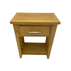 Light oak side table, single drawer with under-tier, and rectangular wall mirror