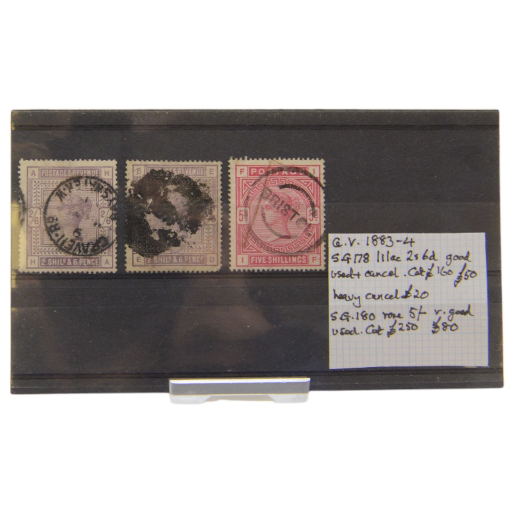 Two Queen Victoria two shilling and six pence stamps and five shilling with 'Bristol' cancel, housed on a stockcard