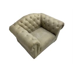 Chesterfield style club armchair, upholstered and buttoned in champagne fabric with stud work