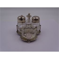 Late Victorian silver mounted four piece cut glass cruet set on stand, comprising pepper shaker, open salt, mustard pot and vinegar bottle, the silver stand with shield engraved with the Workman family crest, hallmarked Hukin & Heath, London 1899, including bottles H7cm