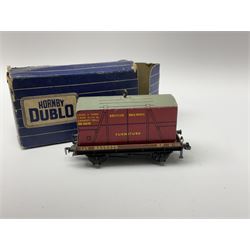 Hornby Dublo - twenty wagons including Cattle Trucks; Low-Sided Wagons; Cable Drum Wagons; Tank Wagon for Shell Lubricating Oil; Mineral Wagons; 20-Ton Bulk Grain Wagons; Goods Brake Vans; Furniture Containers etc; all in blue striped boxes (20)