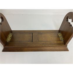 Victorian Betjemann oak book slide, of typical form, the curved hinged and sliding supports with mounted brass Gothic strapwork, stamped Betjemann's Patent 18026, H16.5cm W34cm D15cm