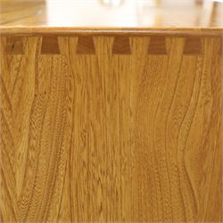 Ercol - mid-20th century light elm and beech Windsor 'model 455' sideboard, rectangular top over three central drawers flanked by cupboards, on castors