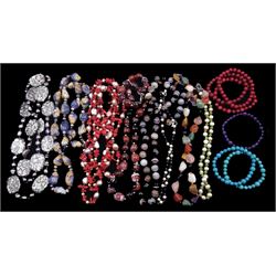Collection of gemstone bead necklaces with silver clasps including agate, tiger's eye and quartz and six gemstone stretch bracelets