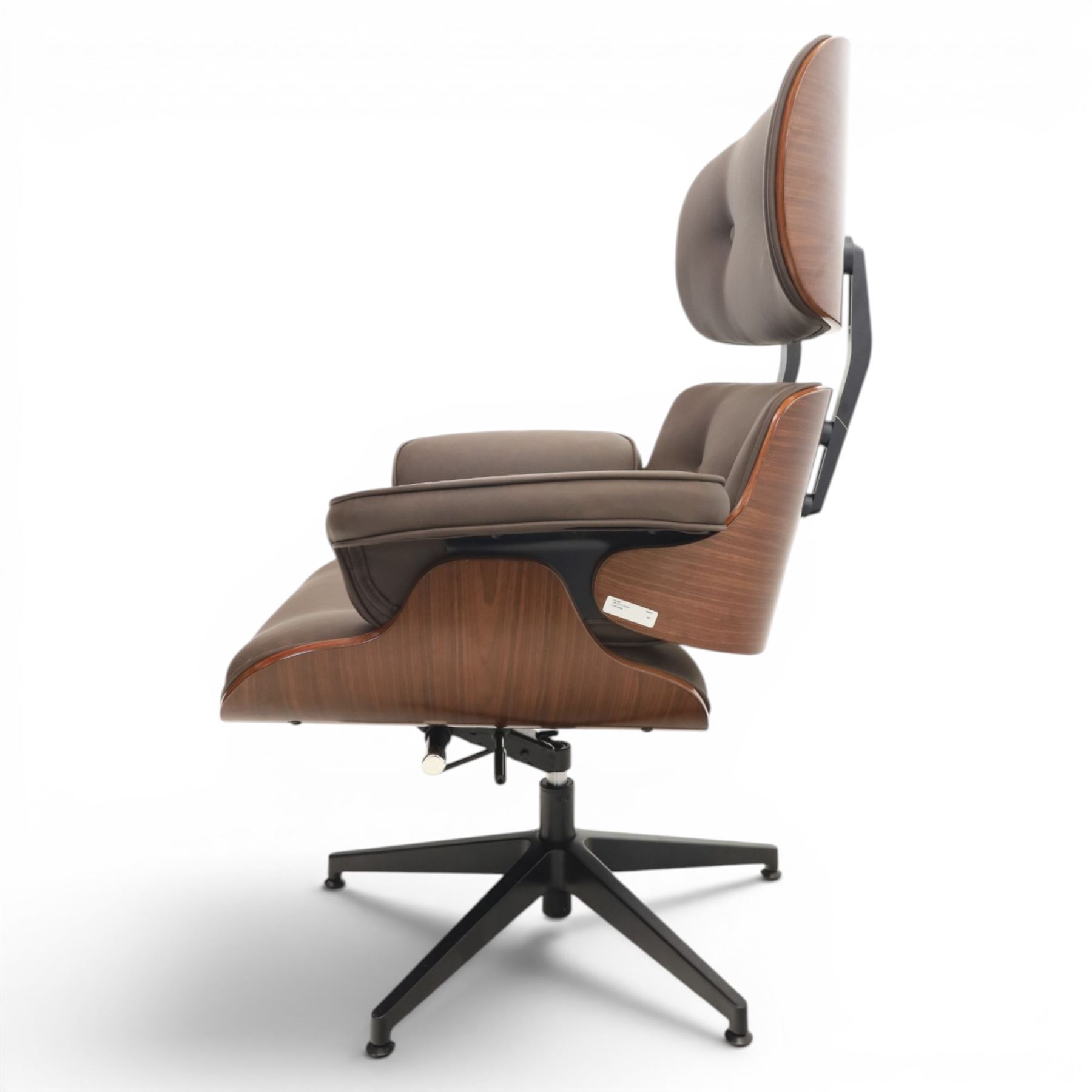 In the manner of Eames' Lounge chair, contemporary brown leather and plywood recliner and footstool, padded leather seat and arm rests, plywood backs raised on a black metal frames, reclines and swivels on a five point base  