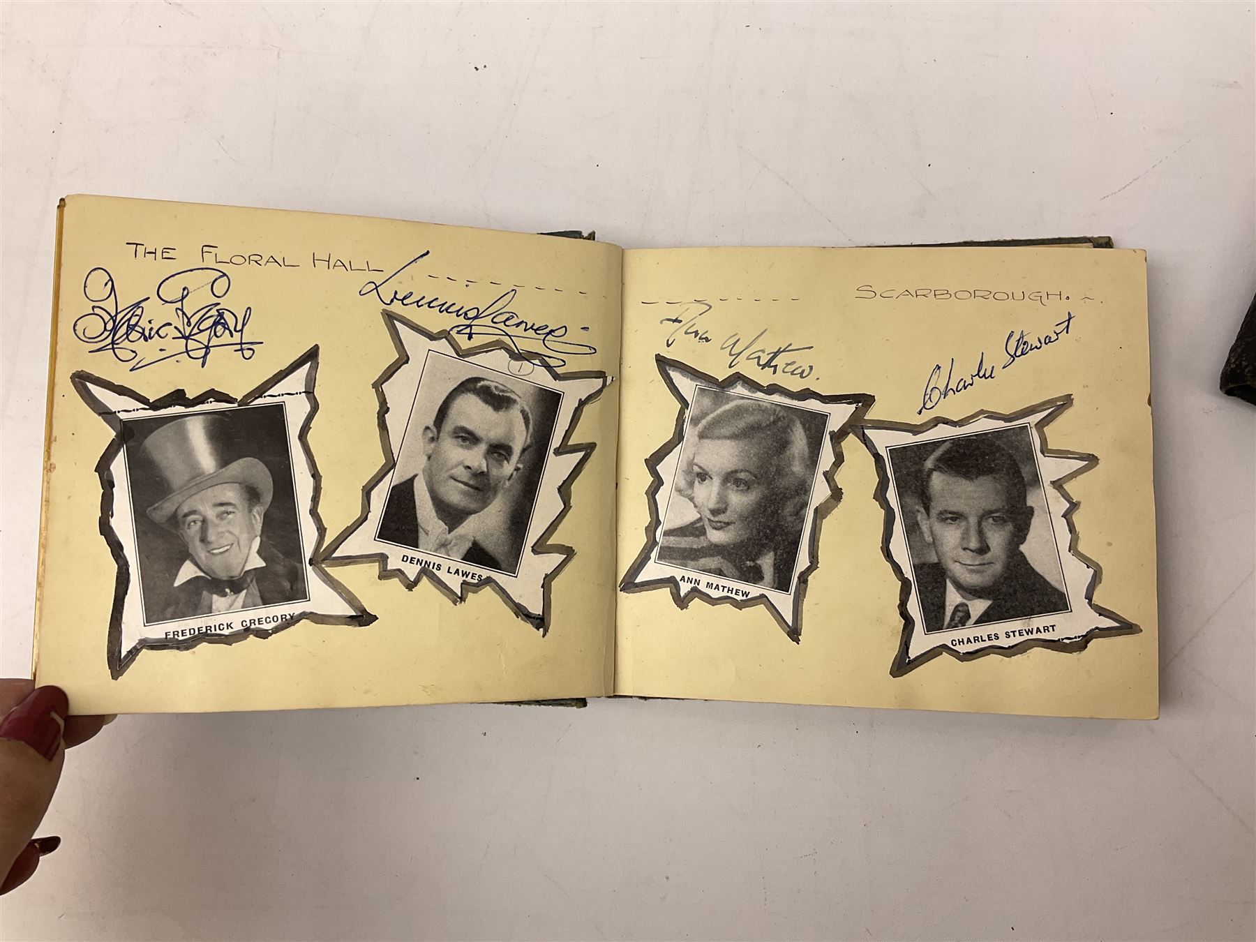 2 autograph albums, containing signatures including Harry Corbett Sooty, Dave Morris, Marion Saunders, Max Bygraves and signed photographs, quantity of postcards depicting the Lords Prayer and playing cards in case