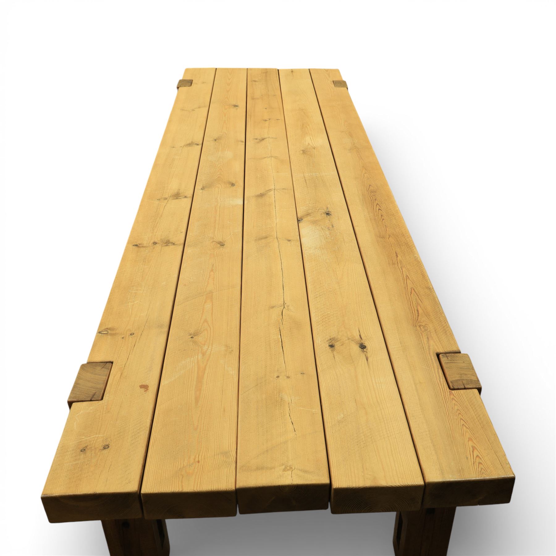 Modern large oak plank top dining table and twelve brown leather high back chairs, table of rustic construction five solid planks with exposed supports, the chairs in brown leather hide with ten standard height and a pair of taller chairs for the foot and head of the table