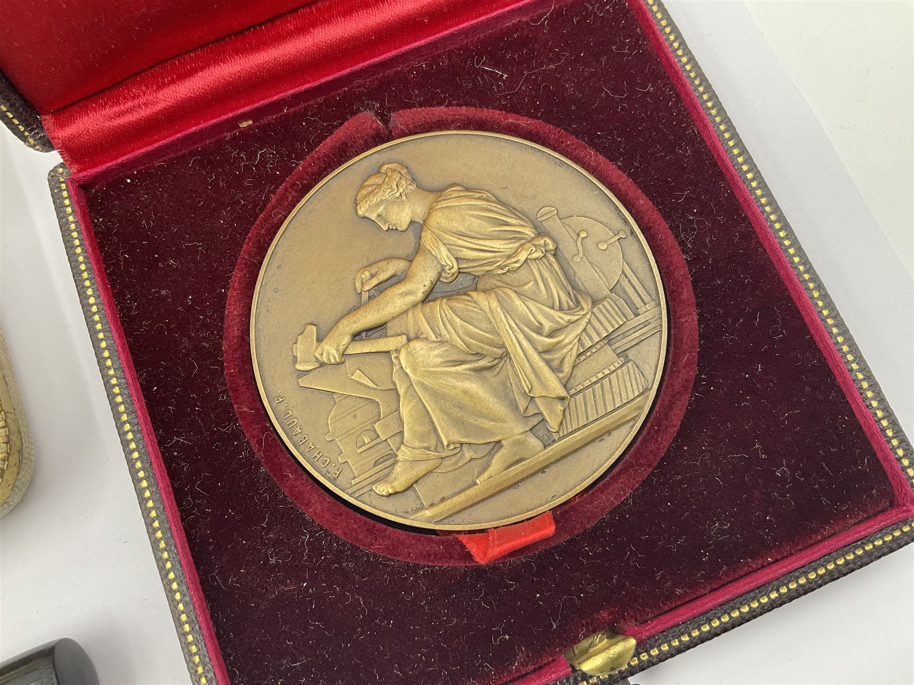 Three parker fountain pens, one example with 14ct gold plated cap and personal engraving, in Parker 51 box, together with a silver Sampson Mordan Everpoint propelling pencil with personal engraving and a silver cased fountain pen with 14ct gold nib and a souvenir bronze Dollfus-Mieg medallion, awarded to John G Sedorski, in fitted case 