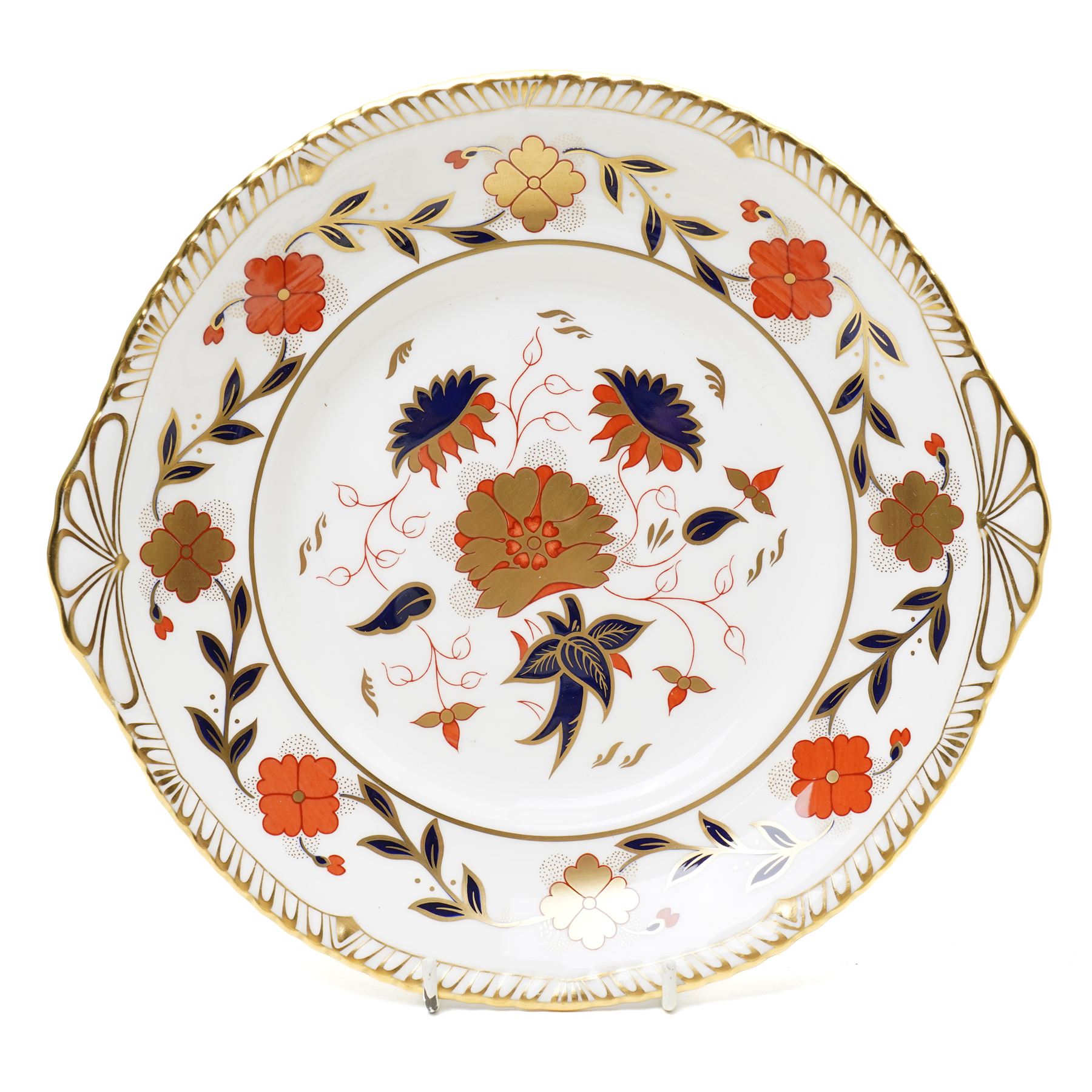 Royal Crown Derby 'Asian Rose' pattern A.962 tea service, comprising tea and coffee pots, open sucrier, milk jug, eight cups and saucers, six side plates, two serving plates, and a boxed Duck with gold stopper