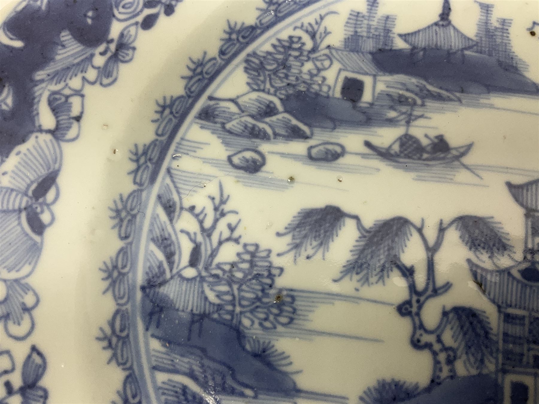 18th century Chinese export blue and white plate of octagonal form, with a pagoda landscape, D23cm
