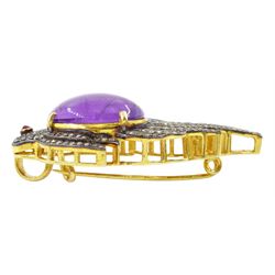 Silver and silver-gilt amethyst, ruby and diamond bird brooch, large cabochon amethyst of approx 12.30 carat, with diamond set feathers and ruby eye, total diamond weight approx 1.15 carat