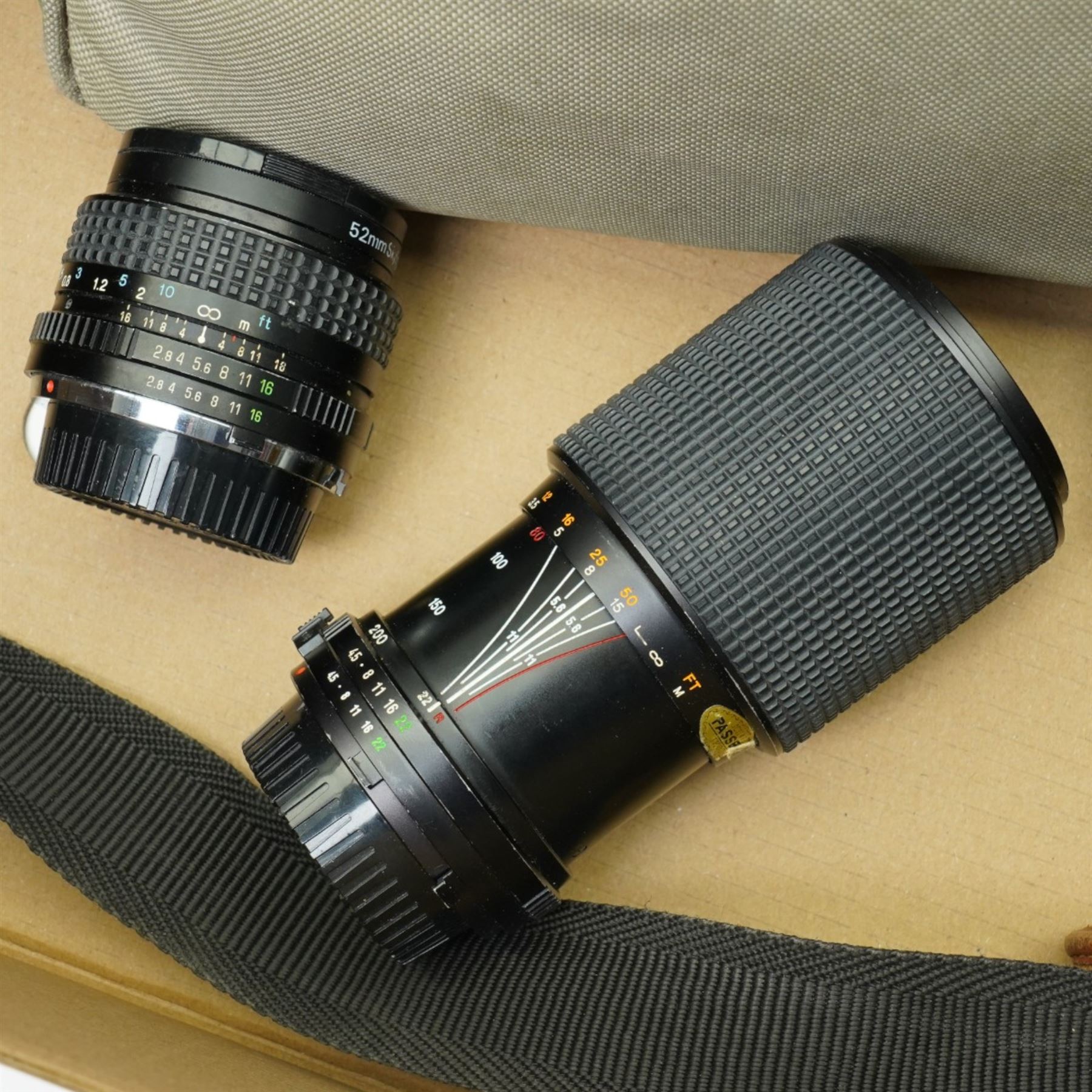 Kodak vest Pocket Hawk-Eye camera, Minolta X-300 camera, Tokina lens and other items