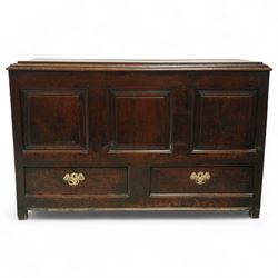 19th century oak coffer, the hinged plank top above a panelled front fitted with two drawers to base, raised on bracket feet