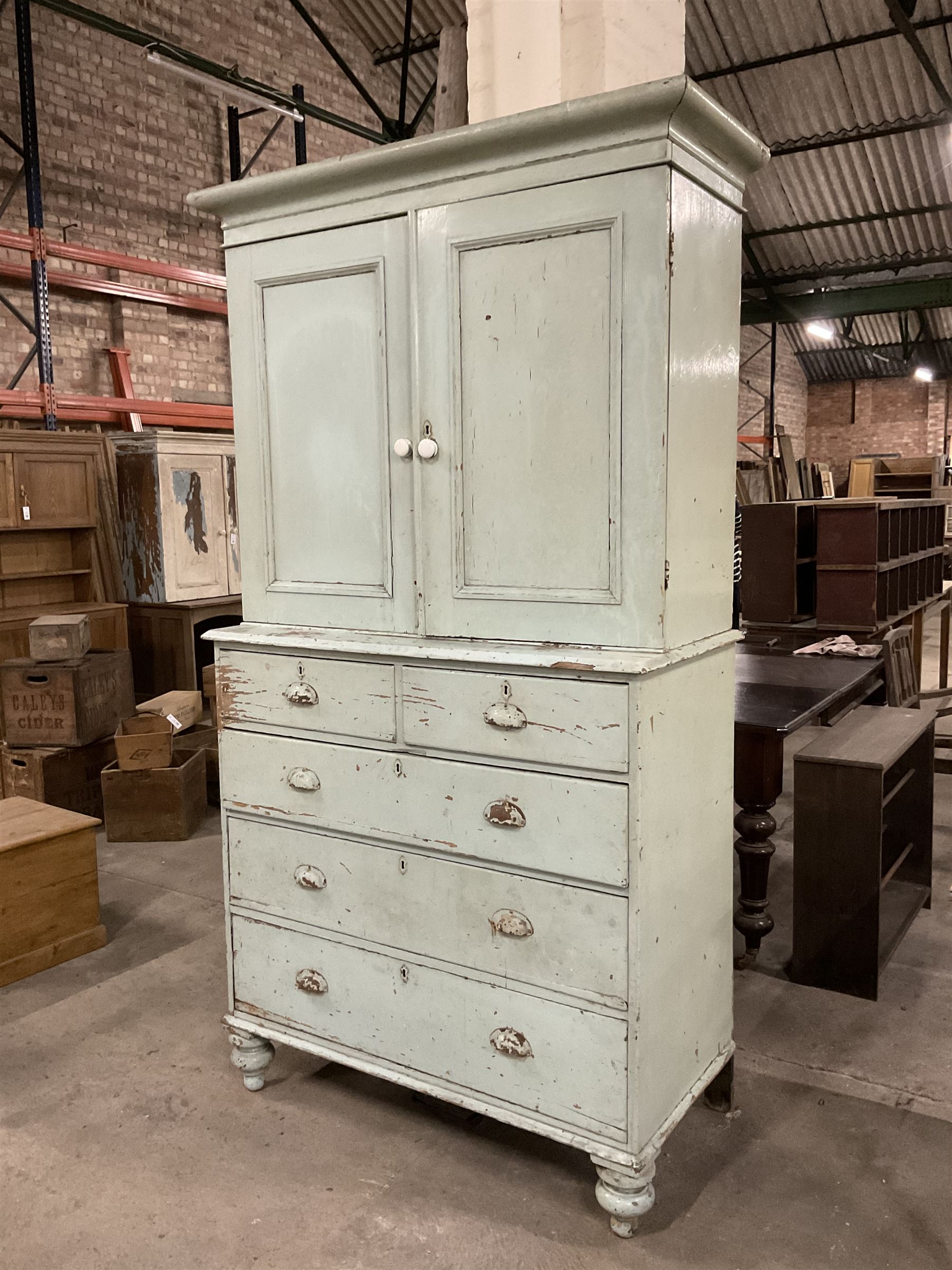 19th century pale blue painted pine housekeepers cupboard, double panelled cupboard enclosing two shelves over two short and three long drawers, on turned feet - THIS LOT IS TO BE COLLECTED BY APPOINTMENT FROM THE OLD BUFFER DEPOT, MELBOURNE PLACE, SOWERBY, THIRSK, YO7 1QY