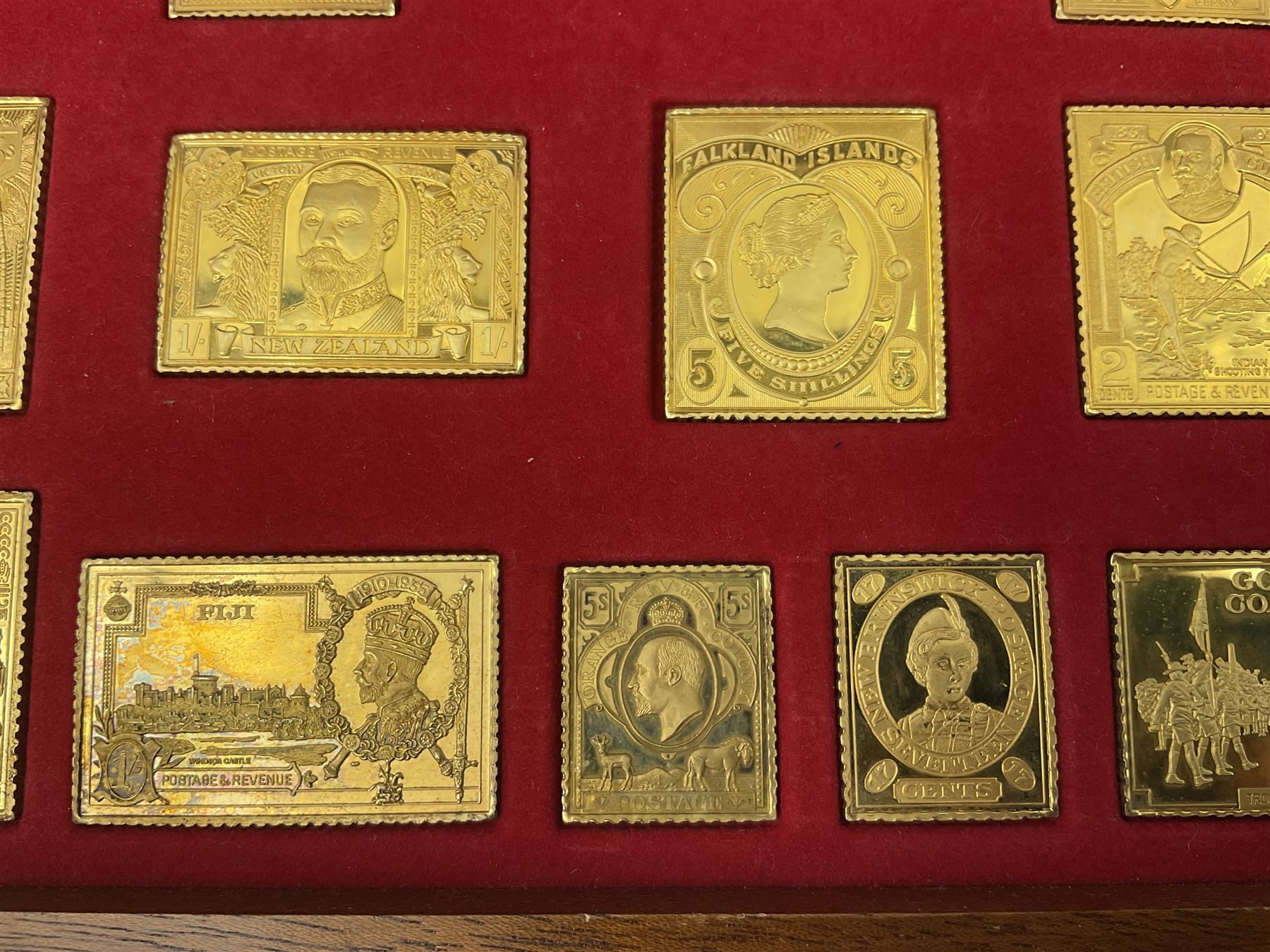 Danbury Mint sterling silver hallmarked stamp ingot set of twenty-five, housed in a fitted wooden case