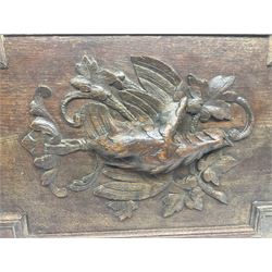 Pair of oak furniture door panels, carved in relief with a fox to one and a hound to the other, together with a pair of smaller oak panels, carved in relief with a hare to one and a grouse to the other, doors W63.cm x H62cm, panels W43cm x H60cm