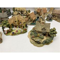Twenty six Lilliput Lane models, to include Golden Harvest, Junk and Disorderley, Heaven Lea Cottage, Old Scrumpy Farm, Chantry Chapel Wakefield, etc, together with four similar cottages