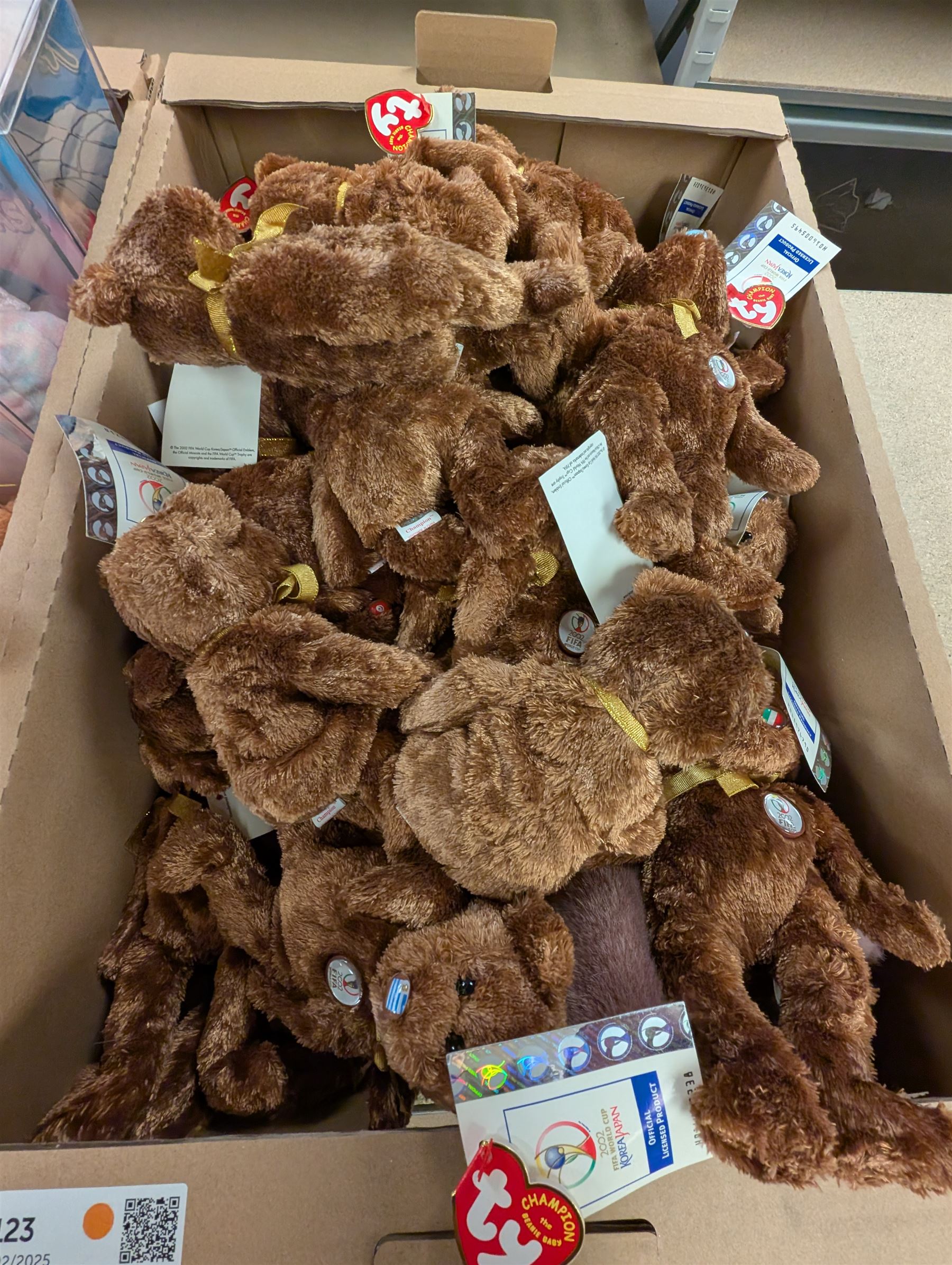Large collection of TY Beanie Babies, including Princess the Bear, set of thirty two 2002 Fifa World cup bears, etc, mostly with tags in tag protectors, in seven boxes