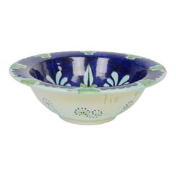 After Torquato Castellani, tin-glazed earthenware bowl, with a floral design the the centre, marked beneath, D19cm 