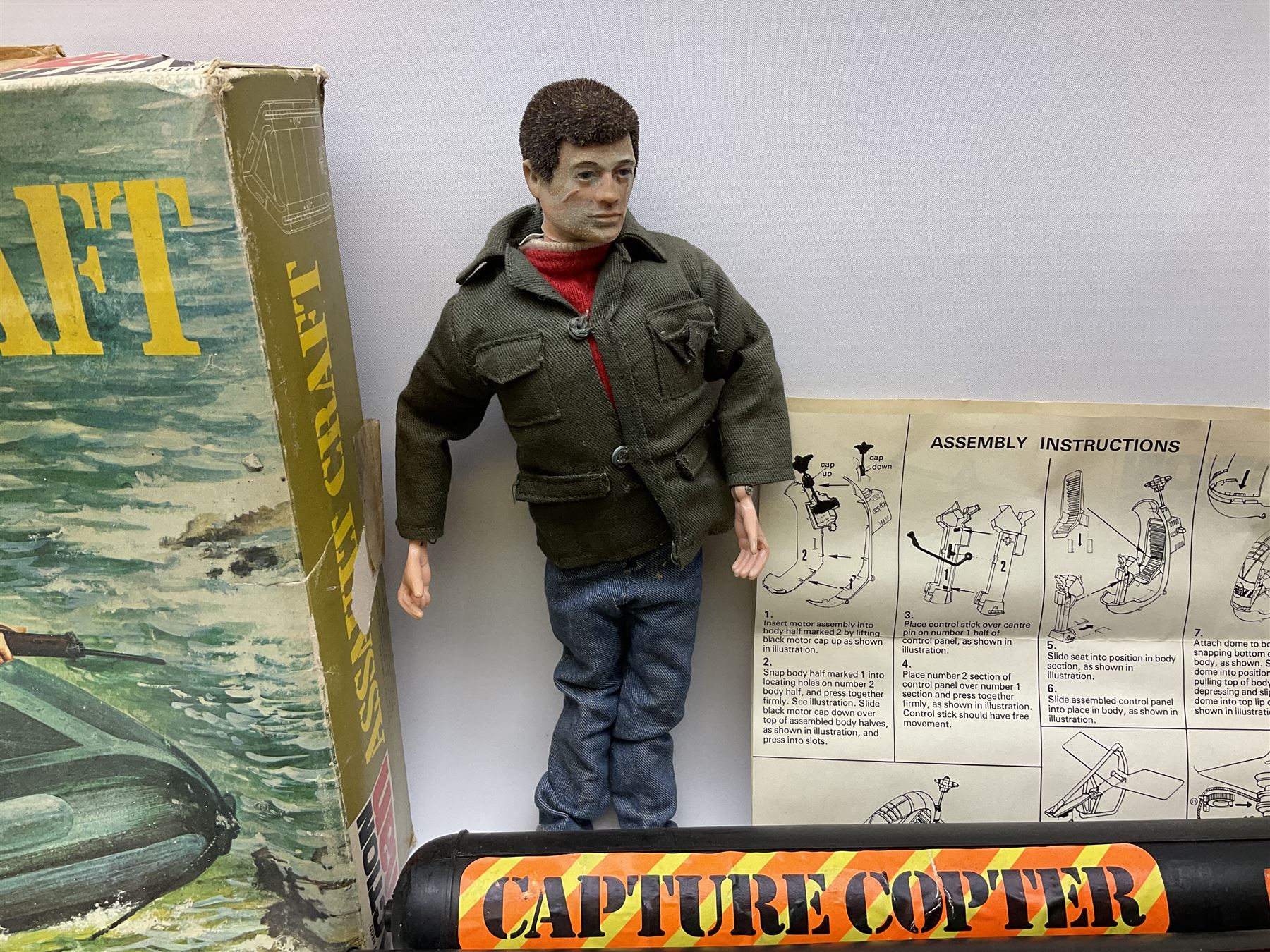 Action Man - one figure, boxed Assault Craft, dismantelled  Capture Copter, two bags of equipment and accessories etc