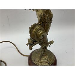 Victorian gilt bronze converted gas lamp in the form of  mythical winged mermaid upon a circular oak base, with a frilled green glass shade, H44cm