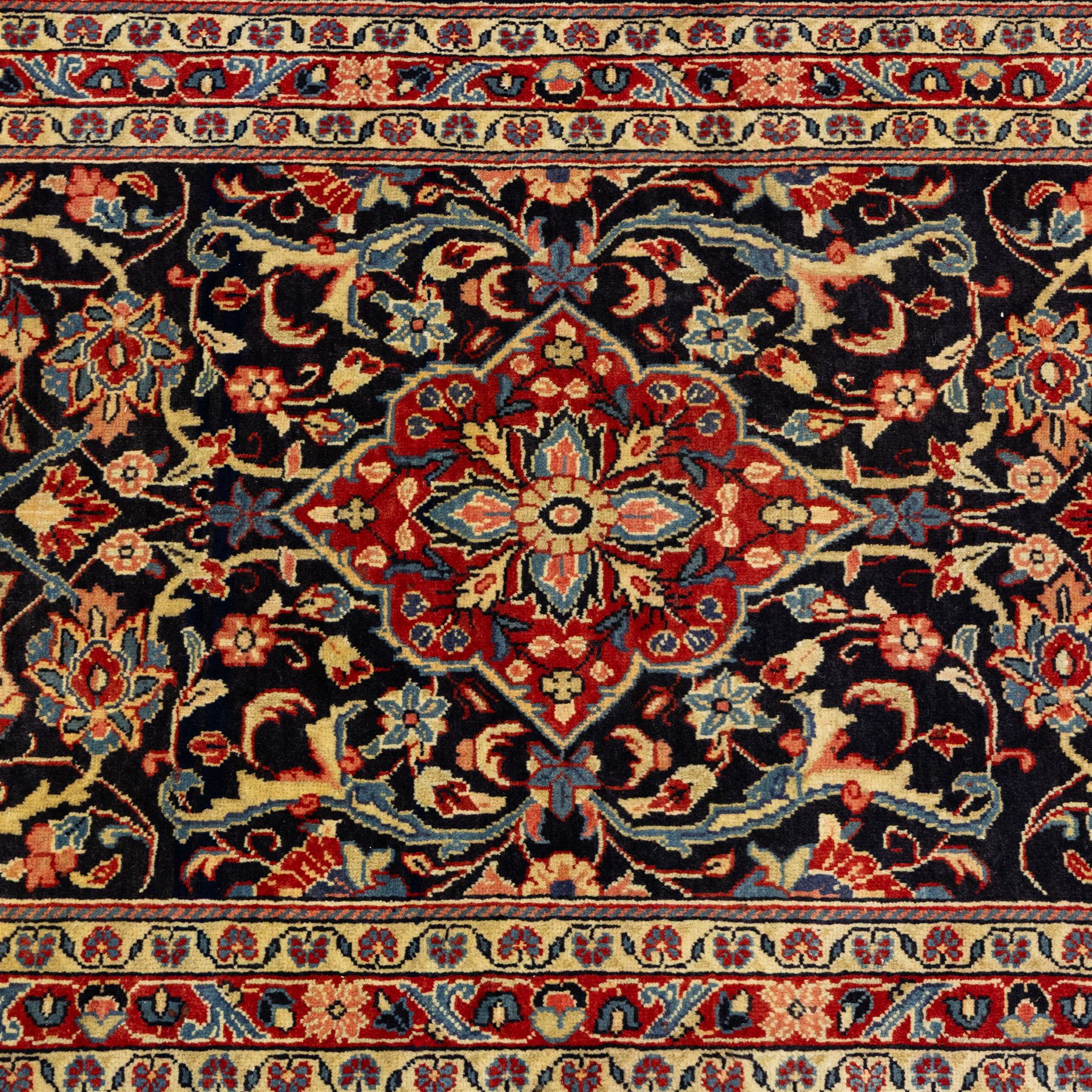 North West Persian Hamadan hand-knotted runner, deep navy field with central stylized medallion with pendants, surrounded by angular floral motifs, within an ivory border of repeating rosettes and stylized leaves, enclosed by guard stripes, fringe ends 