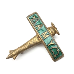  Amy Johnson Souvenir pin badge in the form of a green enamelled aeroplane, the wing inscribed Amy with maps, L2.5cm  