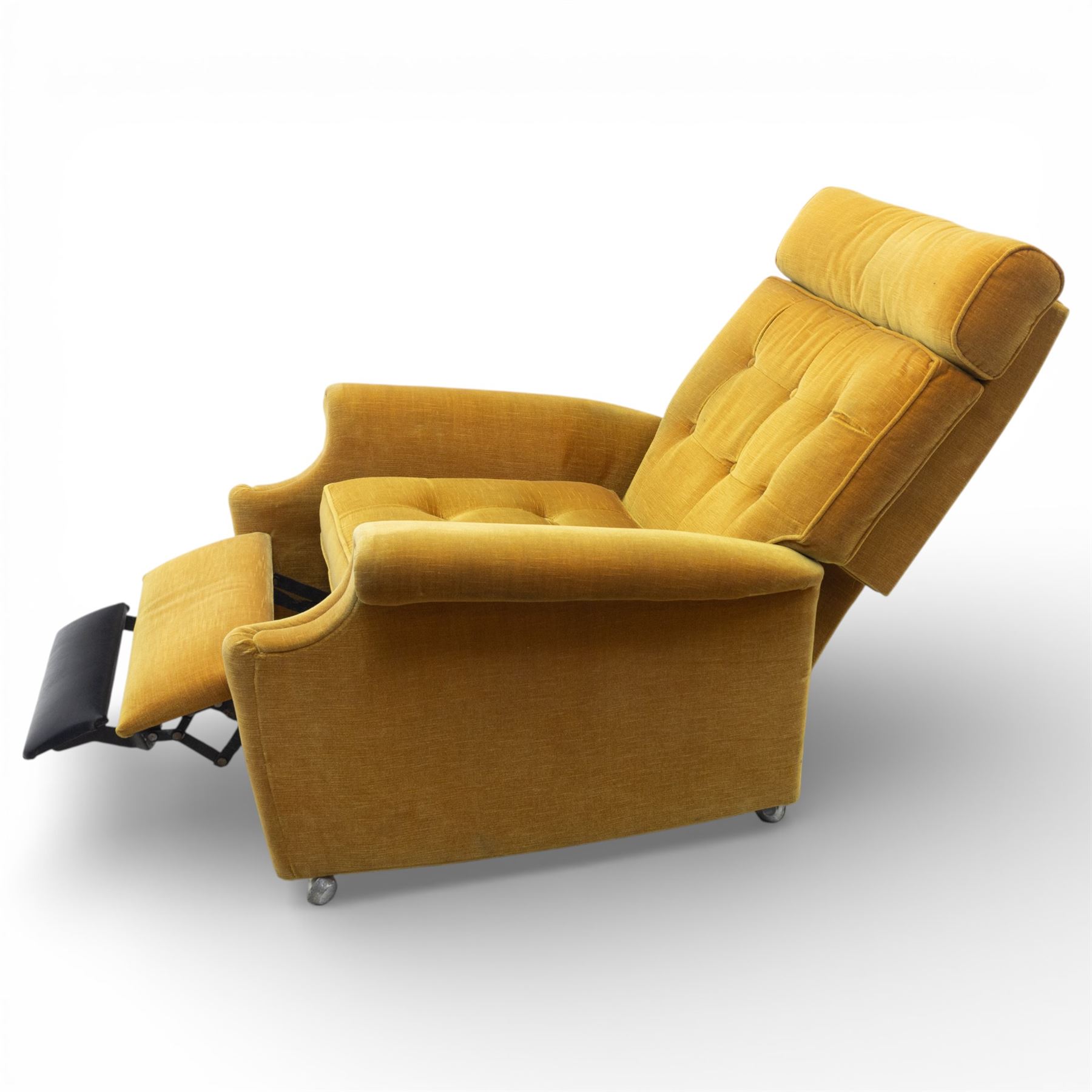 Parker Knoll - Golden yellow velour recliner, raised on castors