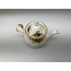 Royal Albert Old Country Roses pattern tea set, comprising teapot, coffee pot, six teacups and six saucers, five side plates, further teacup with joined saucer and side plate, open sucrier, milk jug, cake plate, and preserve pot and cover, together with Royal Albert Jubilee Rose pattern sauce boat and stand, and Royal Albert Lavender Rose pattern cake stand. 