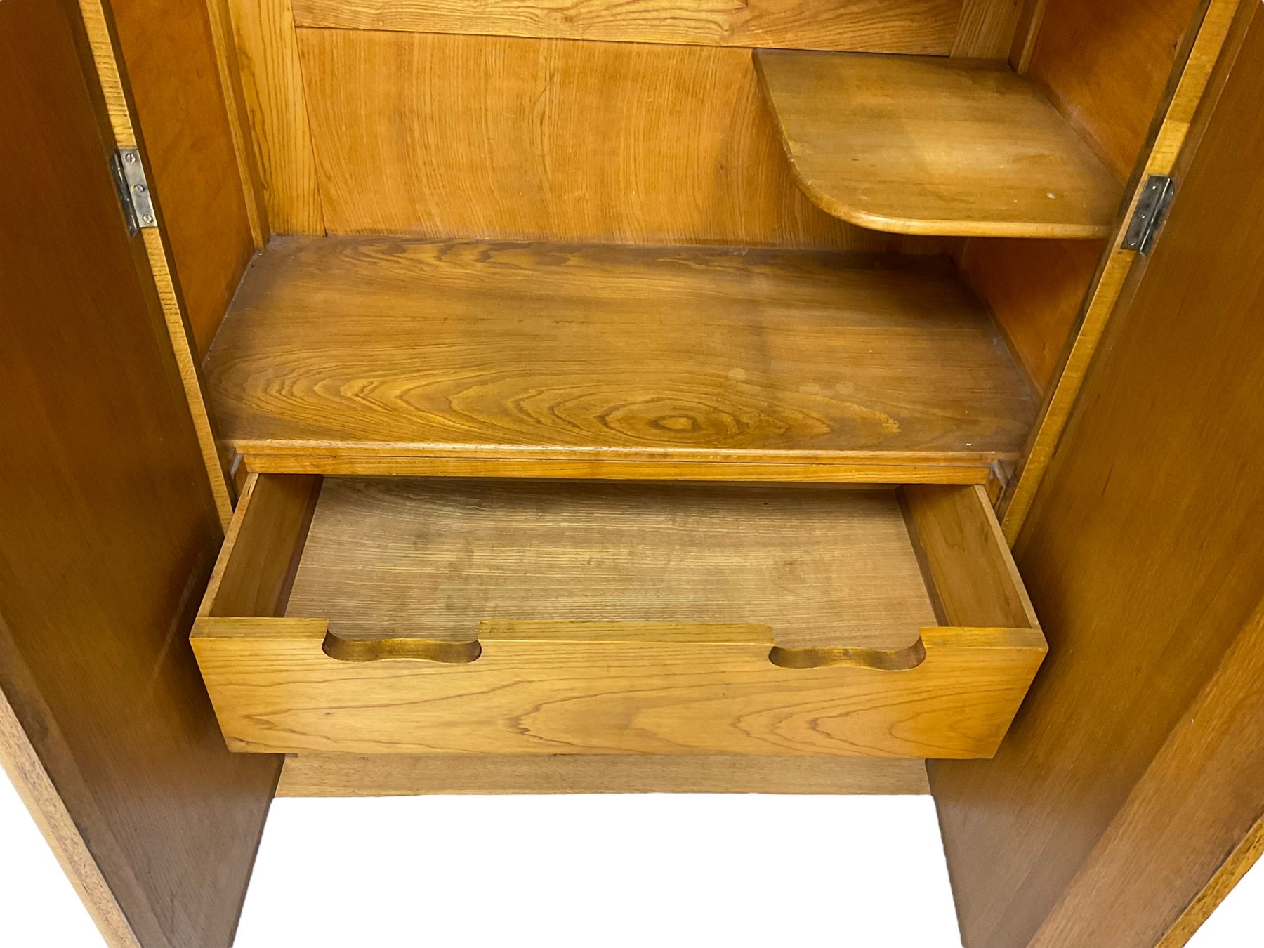 Early 20th century Art Deco period oak Gentleman's wardrobe, the interior fitted with shelves, hanging rails and two long drawers