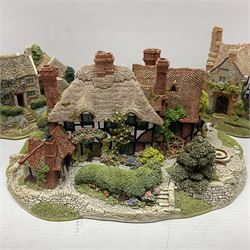 Three Lilliput lanes, comprising Oakwood Smithy, Anne of Cleves and Bluebell Farm, all with deeds and original boxes 