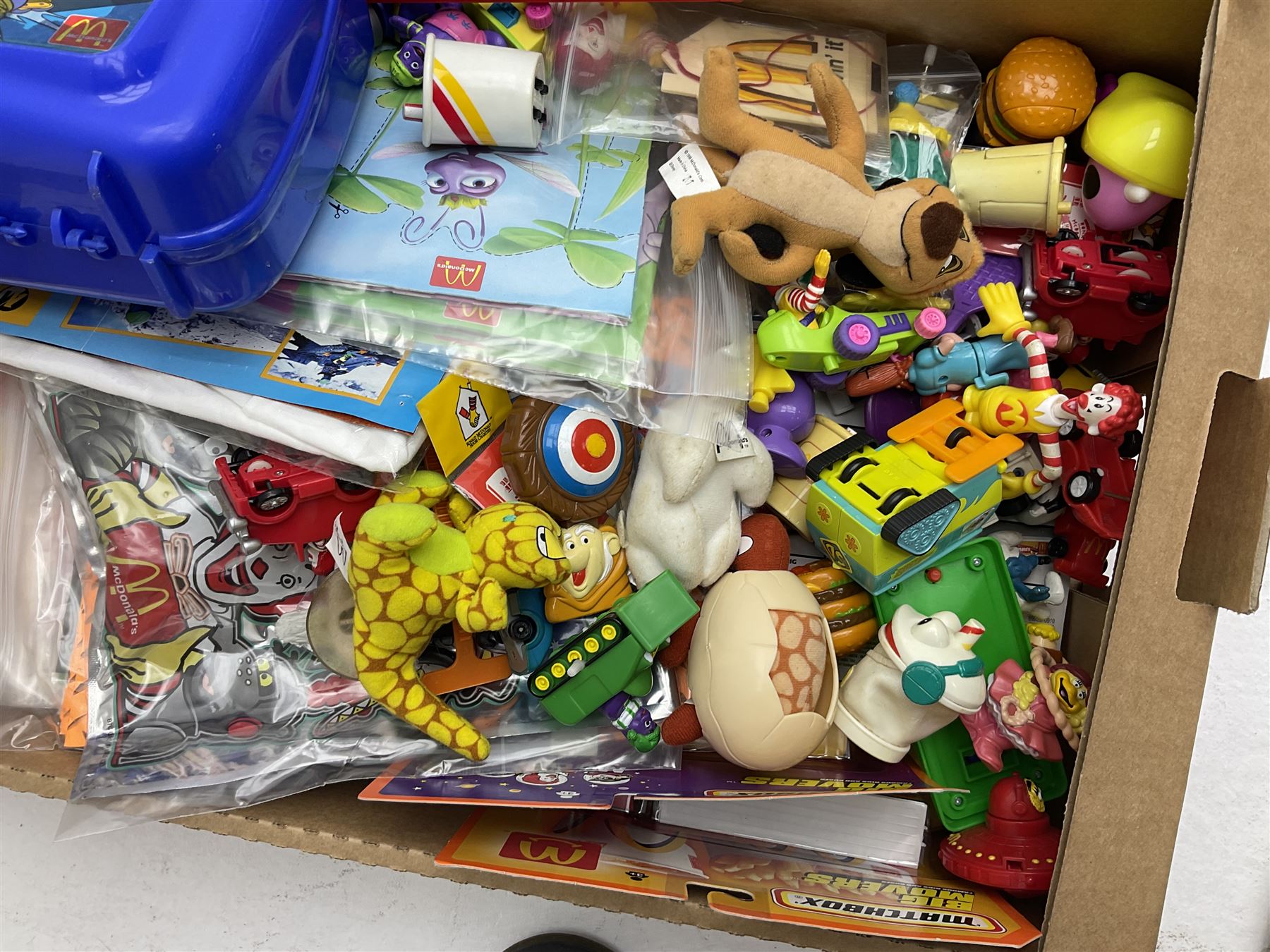 Large quantity of Mcdonalds toys to include Matchbox in four boxes